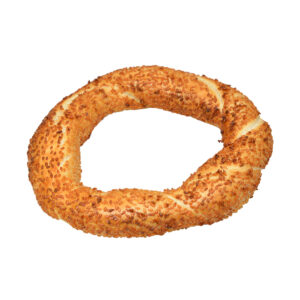 Golden brown sesame ring on a white background.