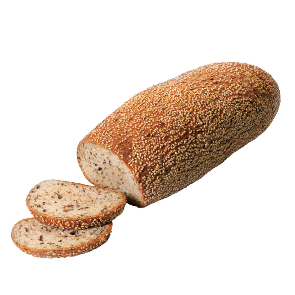 Ein frisch gebackenes Dreikornbrot, verziert mit einer Vielzahl von Samen, mit zwei geschnittenen Scheiben, die seine weiche, luftige Textur enthüllen.